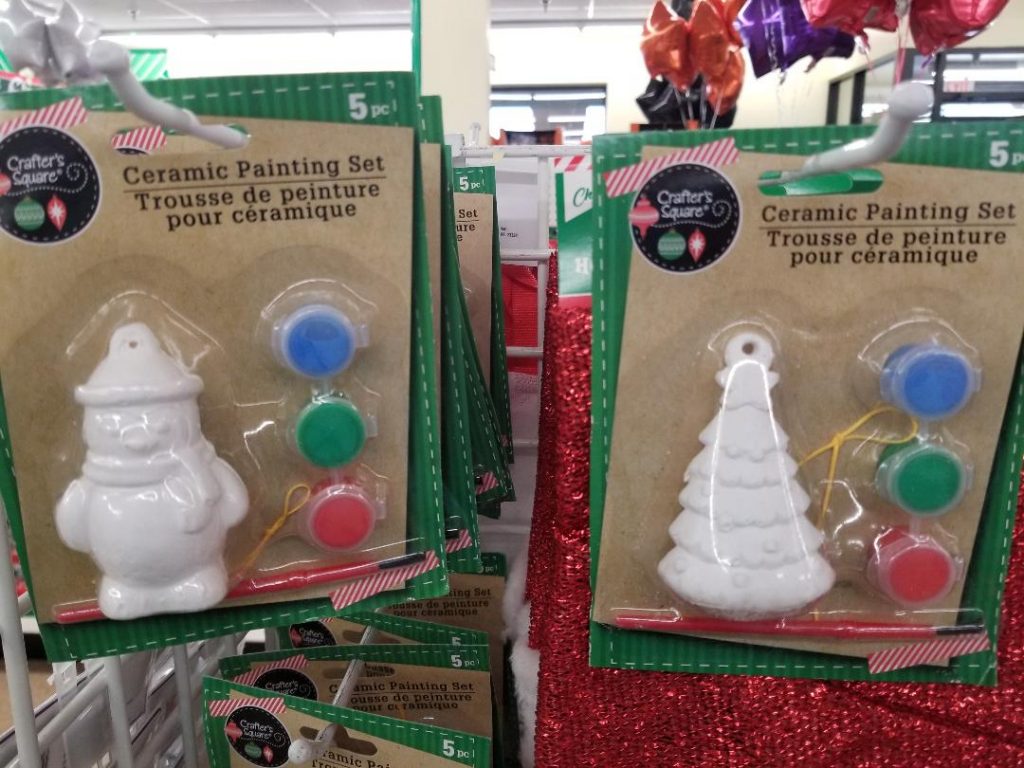Easy DIY craft at dollar tree with ceramic Christmas trees, santa and snowmen to paint in a kit.