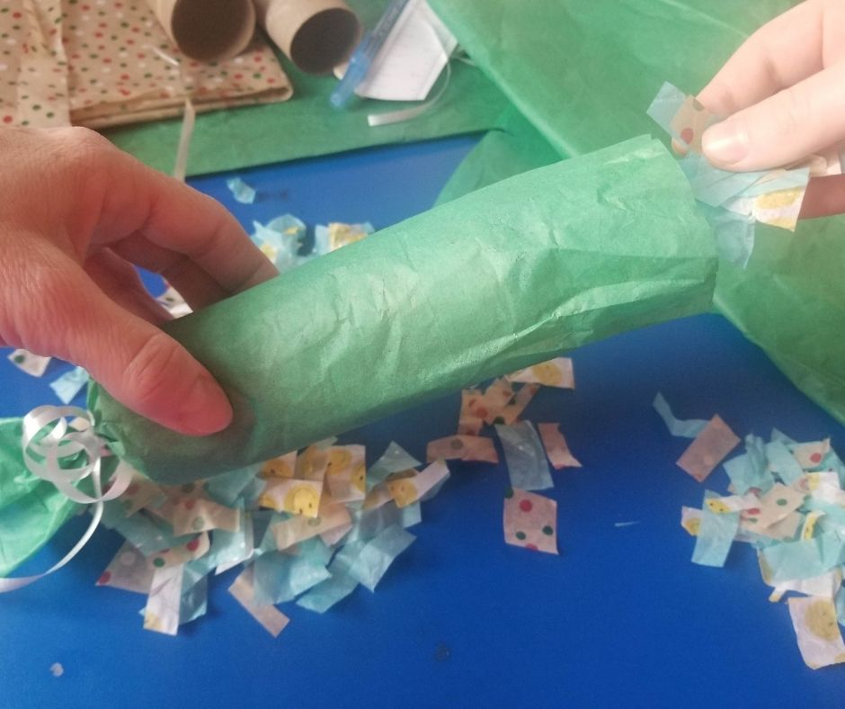 Add confetti to the end of your Party Popper before you tie the end with a ribbon.