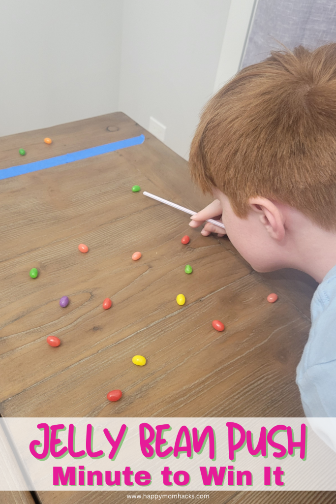 Challenge your family to Easter Minute to Win it Games. They'll love this easy and fun Jelly Bean Push 60 Second challenge. Kids, teens and adults will use a straw to push as many jelly beans as they can over the line before one minute timer goes off. The perfect Easter game for Sunday school, classroom parties, Easter parties or with family on Easter Sunday.