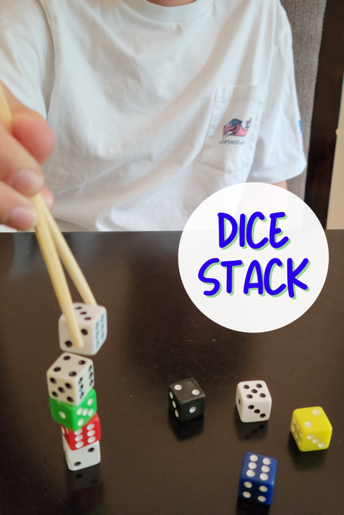 Fun Minute to Win It challenge to stack as many dice as you can with a set of chopsticks before the one minute times is up. A fun Summer family reunion games, summer BBQ picnic game or 4th of July game.