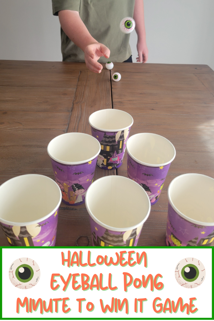 Halloween Table Pong is a fun Minute to Win It Game for Halloween parties using Halloween cups & eyeball ping pong balls. Hilarious & quick 60 second challeges that kids, teens and adults will have a blast playing. Perfect for Halloween teen parties, classroom parties, Office parties, youth groups, adult Halloween parties and family game nights.