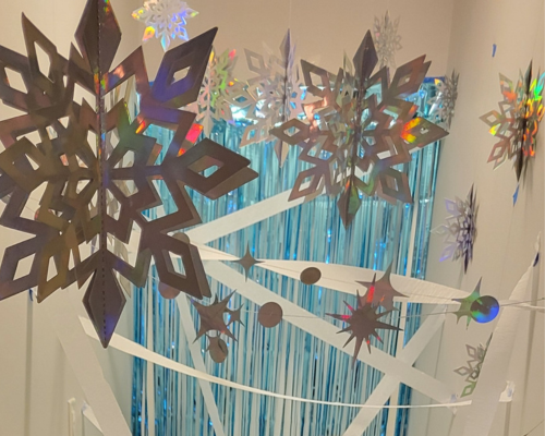 Hang snowflakes to create your winter indoor obstacle course.
