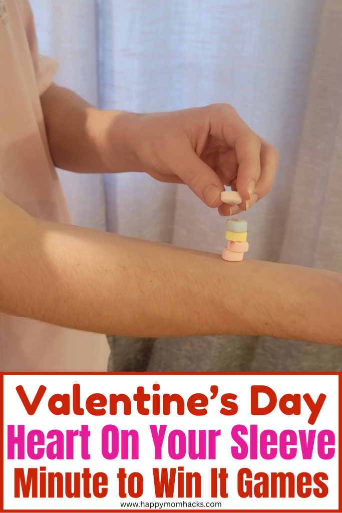 Fun Valentine's Day party games trying to balance Conversation Hearts on your arm. A 60 second challenge to stack hearts the highest. A very funny Minute to Win it game for kids, teens and adults to play as classroom games, Valentine's party games or family game nights.