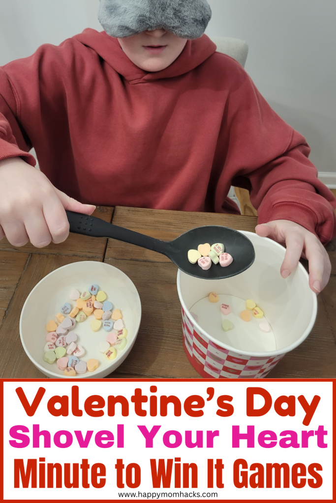 Funny Shovel your Heart Minute to Win it Challenge for Valentine's Day. A quick and silly conversation hearts game that will challenge friends and family to move heart candies while blindfolded. Perfect party game for Valentine's Day, classroom Valentine's parties, teen valentine's parties, Galentine's parties, sleepovers or family game nights. All ages can play from kids to teens and adults!